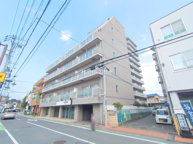 【中古マンション】鶴ヶ島駅通りダイカンプラザの外観|前面道路と物件