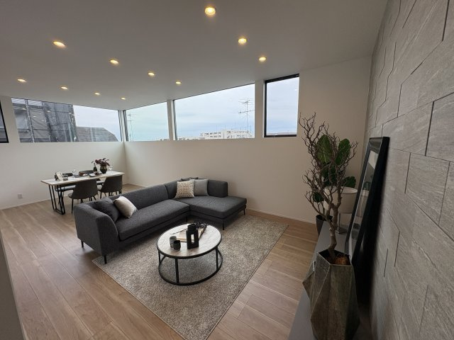 光と風が通う、仁川町の新築プロジェクトの居間・リビング