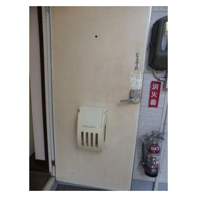 アークビラKの玄関