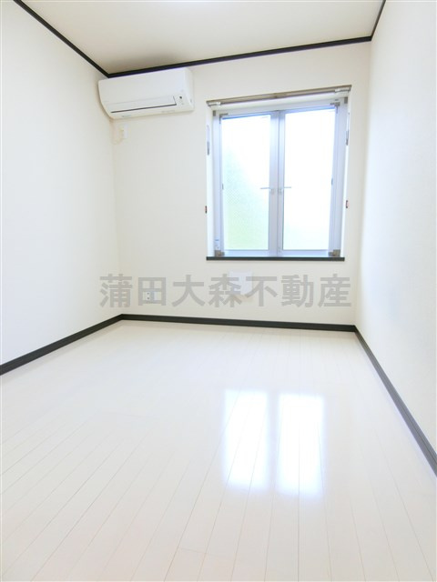 エスポワール羽田壱番館の居間・リビング|洋室