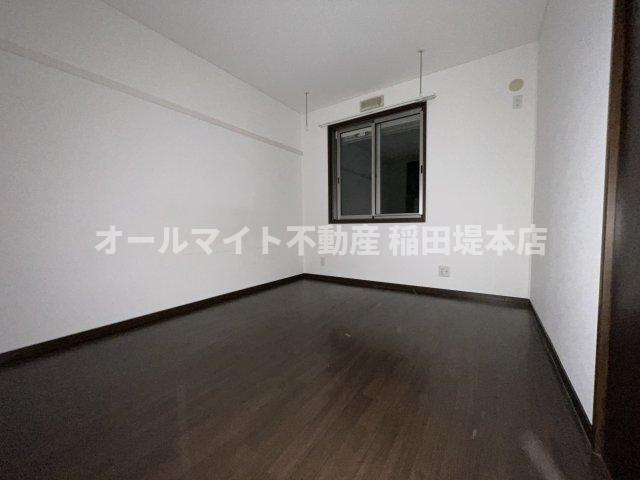 調布市調布ケ丘１丁目のアパートの寝室