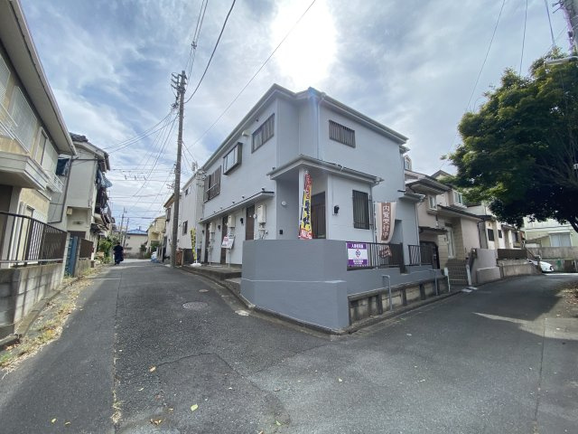 コーポ高橋（賃貸併用住宅）の前面道路含む現地写真