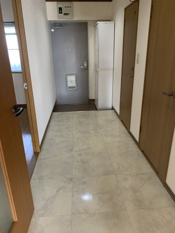 ルーチェ香住ヶ丘の玄関