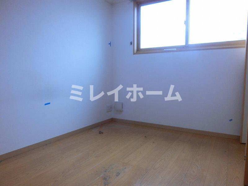 カーサ大井倉田の寝室