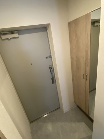 稲城市大丸の賃貸マンションの玄関