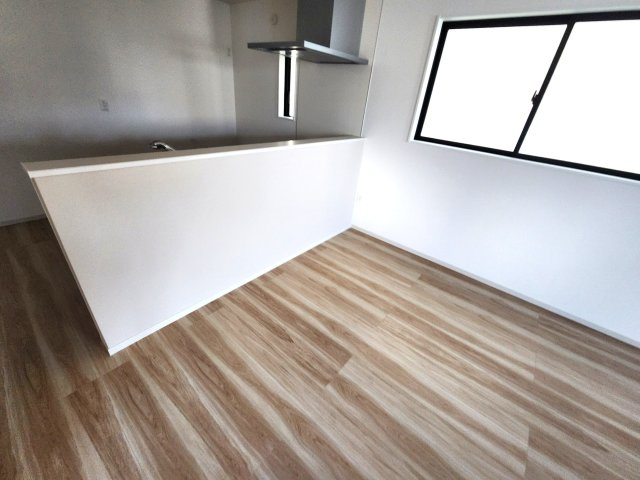 福岡市西区愛宕浜第1-3棟（1号棟）　の内観：施工例|キッチンから立ち込める香りが今日の料理を期待させます。