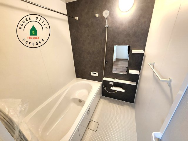 福岡市西区愛宕浜第1-3棟（2号棟）　の内観：施工例|1日の疲れを癒してくれる広々バスルーム。雨の日のお洗濯にも大活躍な浴室乾燥機付です！