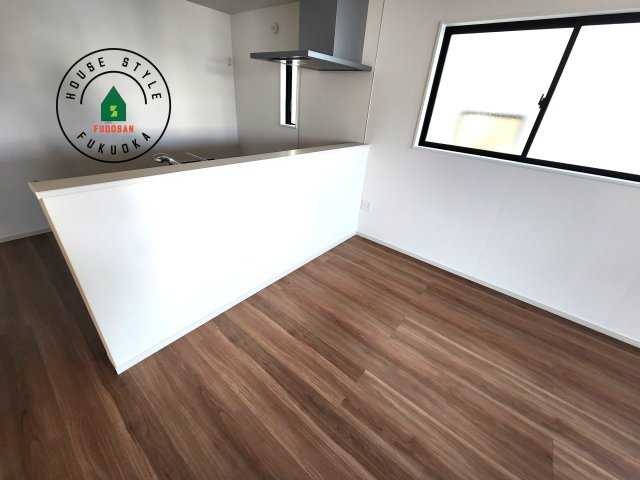 福岡市西区愛宕浜第1-3棟（2号棟）　の内観：施工例|キッチンから立ち込める香りが今日の料理を期待させます。