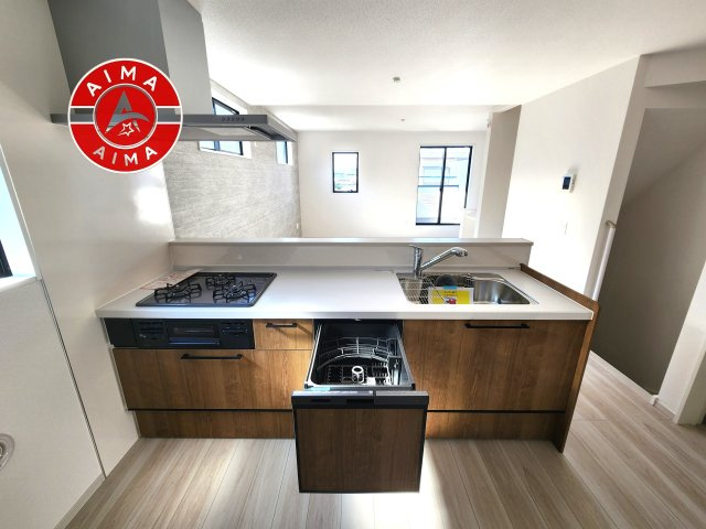 福岡市西区愛宕浜第1-3棟（3号棟）　のキッチン|ご家族を近くに感じられる対面キッチンのLDK。会話もはずみそうですね。
