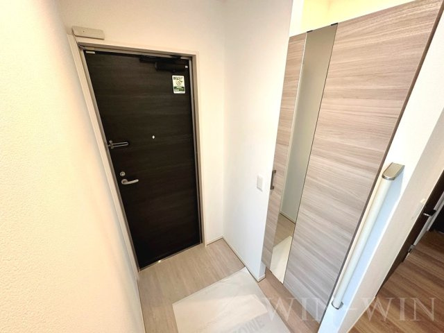 ファミール駅西の玄関