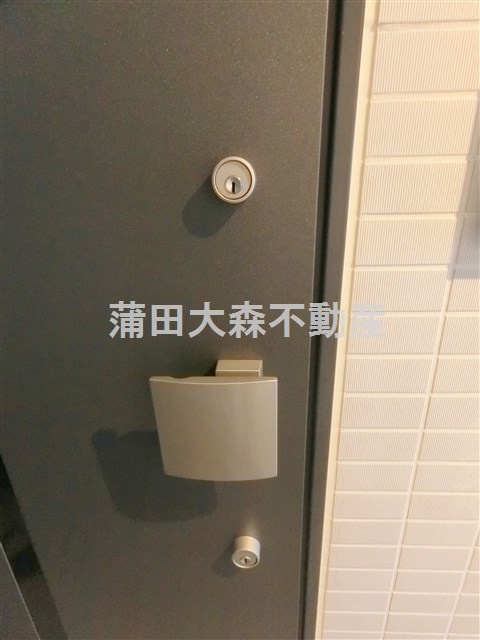 ハーモニーレジデンス大森山王＃002の玄関