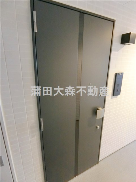 ハーモニーレジデンス大森山王＃002の玄関