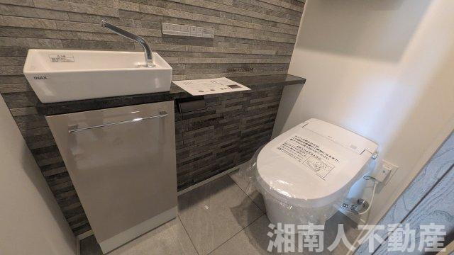 クリオ鵠沼海岸グランロワのトイレ|落ち着いた色調のトイレです