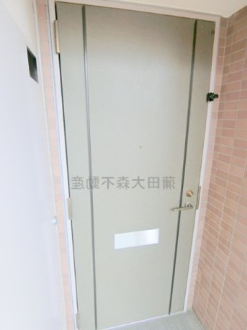 KDXレジデンス東雪谷の玄関