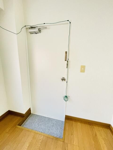 峰マンションの玄関