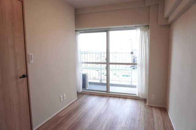 日商岩井草加マンションの洋室