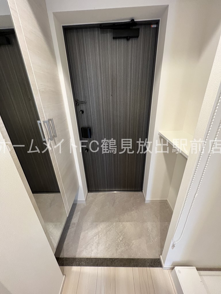 大阪市城東区鴫野東２丁目の賃貸マンションの玄関