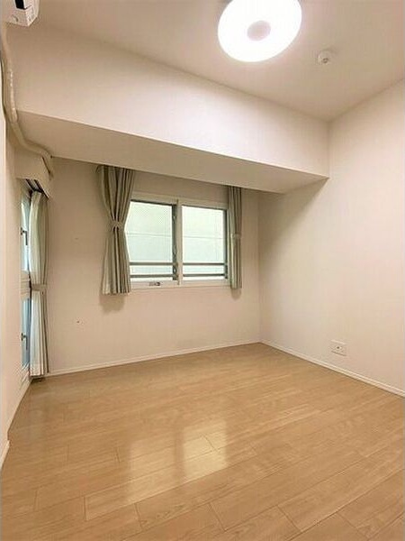 ナイスロイヤルタワー北四番丁の寝室