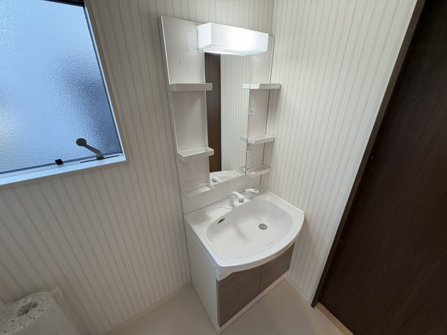 明石市大蔵中町貸家の洗面所