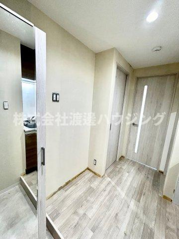 ワコーレヴィータ江坂WESTの玄関