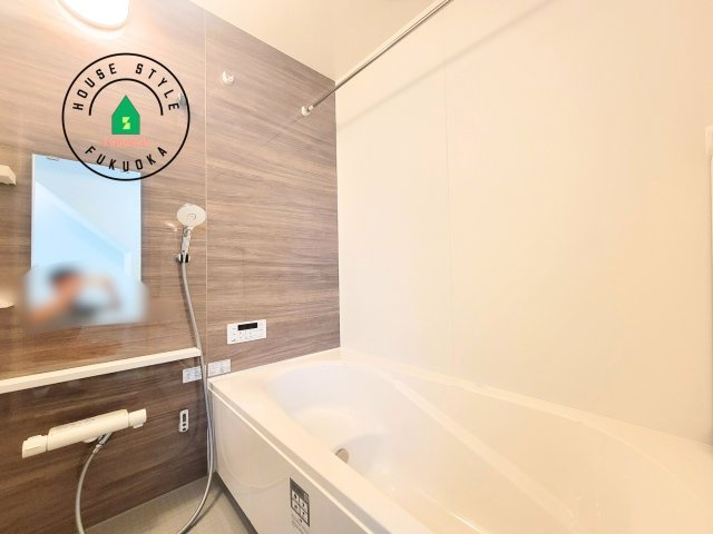 福岡市東区千早1丁目第2-2棟(1号棟)の内観：施工例|1日の疲れを癒してくれる広々バスルーム。雨の日のお洗濯にも大活躍な浴室乾燥機付です！