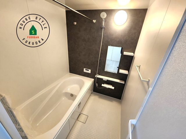 福岡市西区愛宕浜第1-3棟（3号棟）　の内観：施工例|1日の疲れを癒してくれる広々バスルーム。雨の日のお洗濯にも大活躍な浴室乾燥機付です！