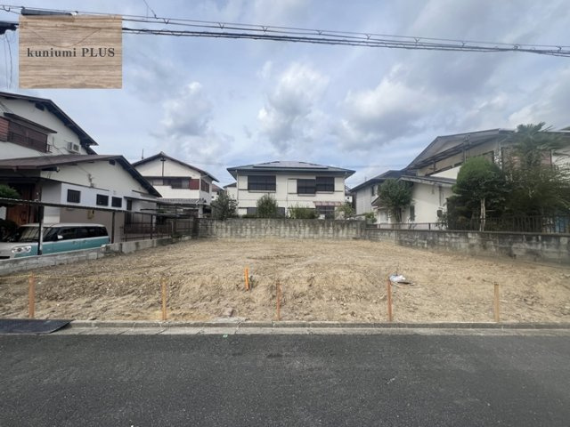 枚方市香里ケ丘12丁目　1号地の前面道路含む現地写真