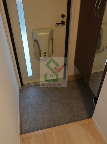 ハウス三生の玄関