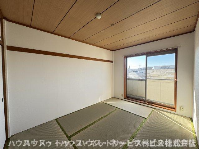 メゾンコムラの寝室