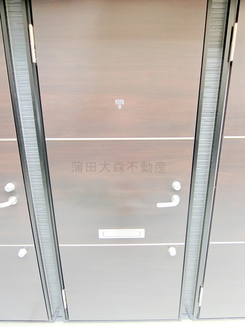 Cスクエア矢口の玄関