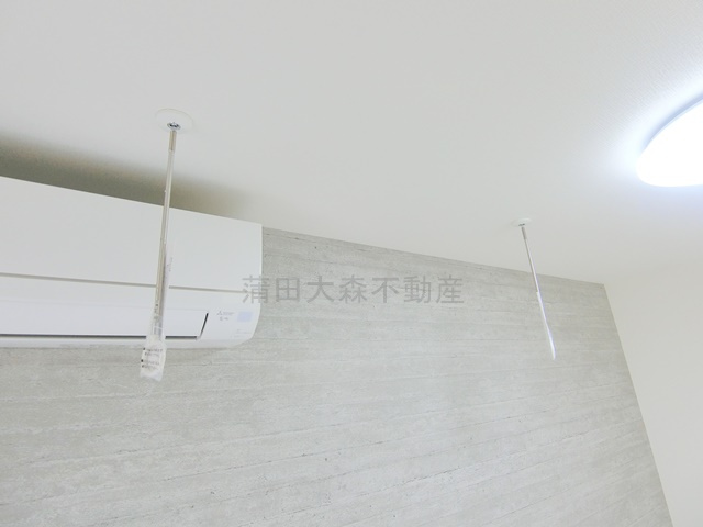 Cスクエア矢口の設備|エアコン　室内物干し　グレーカラーのアクセントクロス！