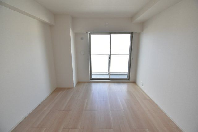 リアライズ今里南の寝室