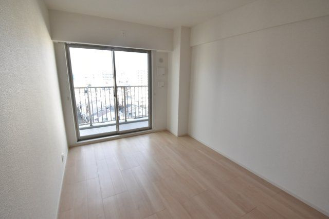 リアライズ今里南の寝室