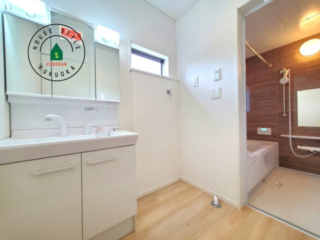 糟屋郡新宮町緑ヶ浜２丁目第1-2棟（2号棟）の内観：施工例|脱衣所、洗面所は小さなプライベートスペース。歯磨き、洗顔と毎日施す個人空間。