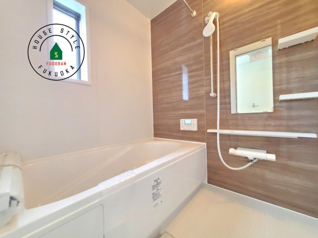 糟屋郡新宮町緑ヶ浜２丁目第1-2棟（2号棟）の内観：施工例|浴室は一日の疲れを癒す場所だから、家族みんながゆったりできる快適設計。追い炊き機能付きオートバス。安定した温度で、いつでも快適に入浴できます。