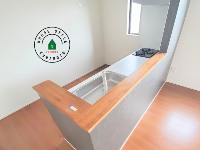 熊本市中央区帯山5丁目第1₋2棟(1号棟)の内観：施工例|キッチンから立ち込める香りが今日の料理を期待させます。