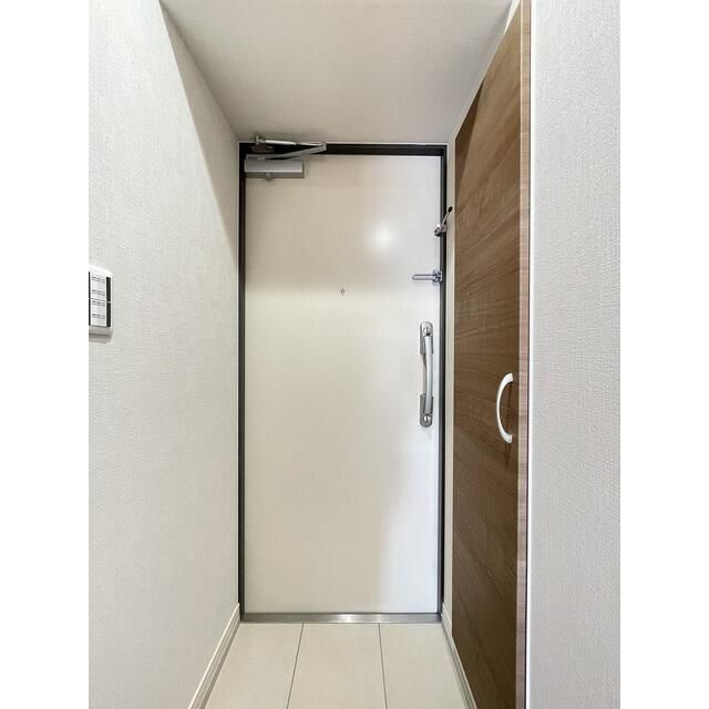 アルファコート常盤台３の玄関