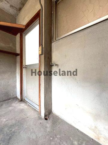 岩橋戸建の設備|洗濯機置場は1階倉庫内