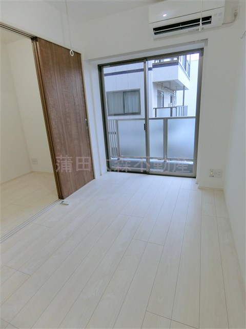 ガリシア矢口渡の居間・リビング|洋室5帖