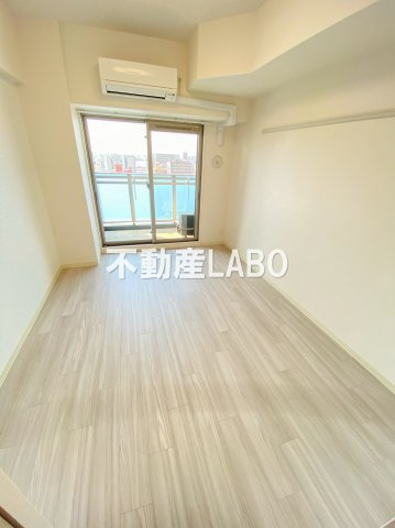 プレサンスOSAKA DOMECITY クロスティの居間・リビング