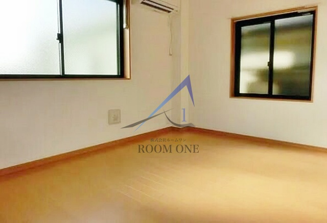 サンライトマンションⅢの居間・リビング|洋室のお部屋です。