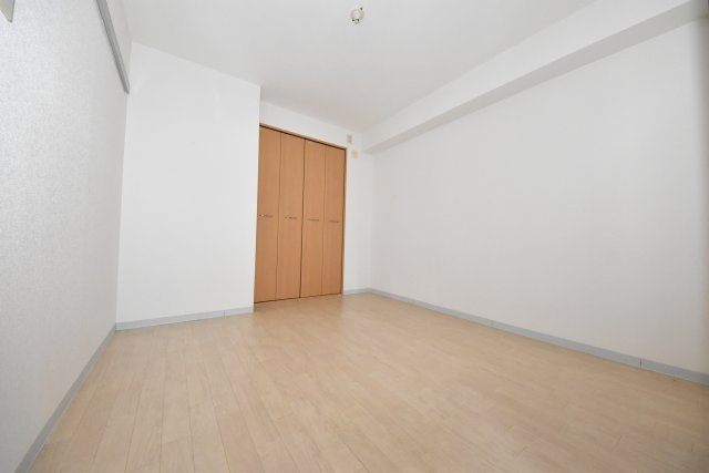 JUNWAマンションの寝室