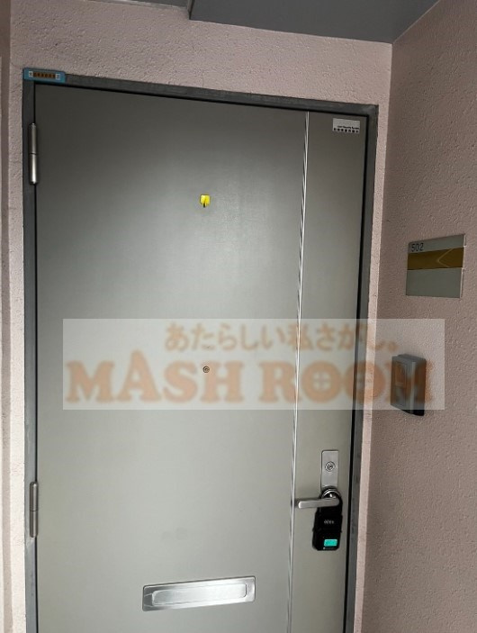 ドミールSASUGAのエントランス