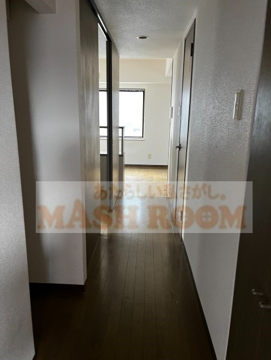 ドミールSASUGAの玄関