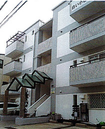 白い小さなマンション六甲のエントランス