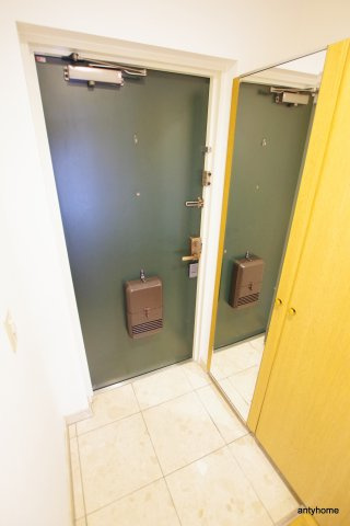 アスティオン江坂　仲介手数料無料の玄関