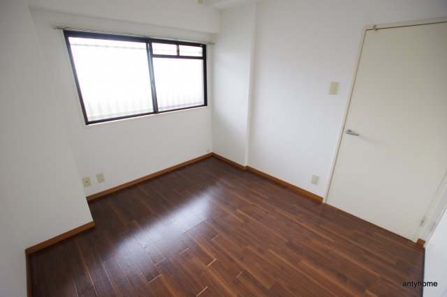 アスティオン江坂　仲介手数料無料の寝室