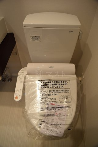 大阪市西区千代崎１丁目の賃貸マンションのトイレ