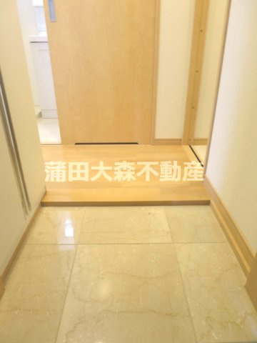 ルクシェール武蔵新田の玄関