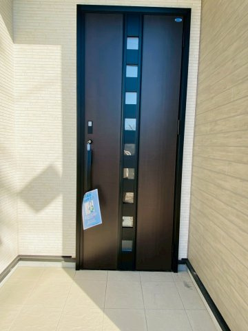 ブルーミングガーデン／北区鶴羽田１丁目／１号棟の玄関